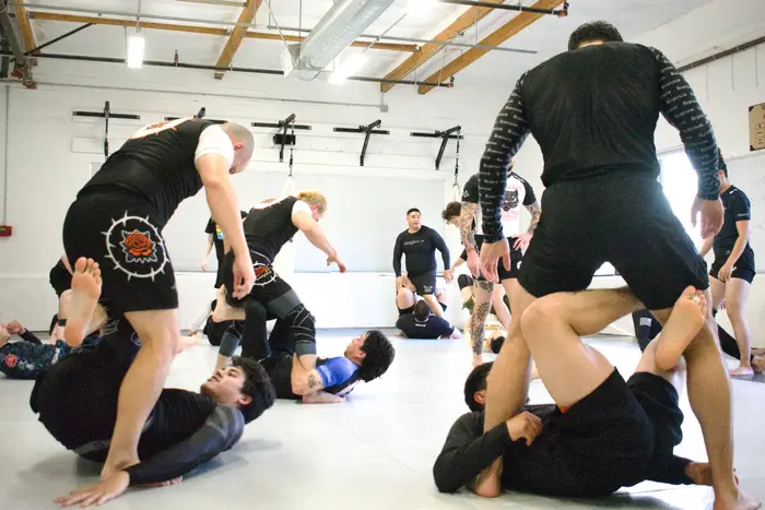 Team training session on the mats at 10th Planet Mission Viejo
