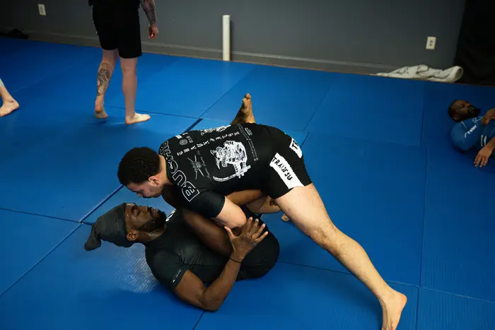 Two students in the middle of a Jiu Jitsu round