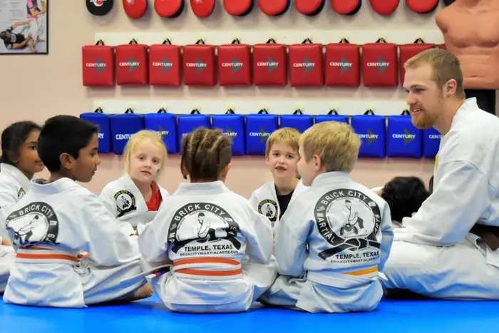 Dane McDonald and his young grapplers at Brick City Martial Arts