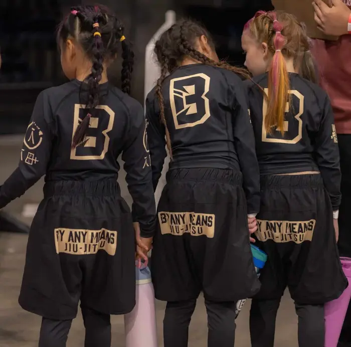 Coach and students at By Any Means Jiu-Jitsu