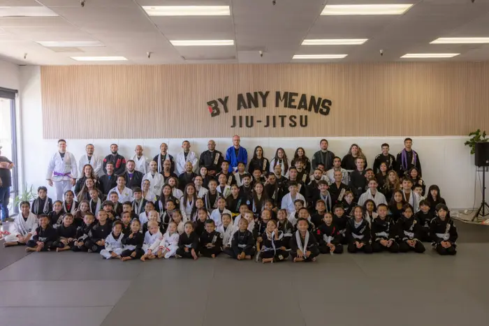 Group photo of the By Any Means Jiu-Jitsu team