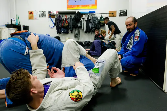 Students training Brazilian Jiu-Jitsu at Chicago School of Grappling