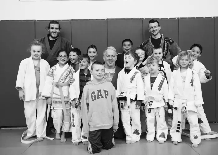 Connors kids martial arts class group photo on the mats