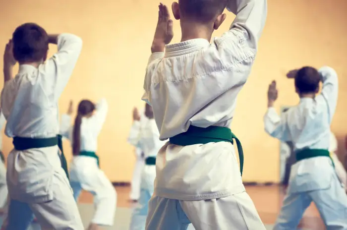 Students training together on the mats