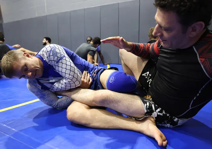 Students drilling Brazilian Jiu Jitsu in the gi