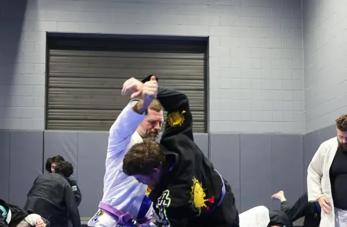 Members training Brazilian Jiu Jitsu at Hamel
