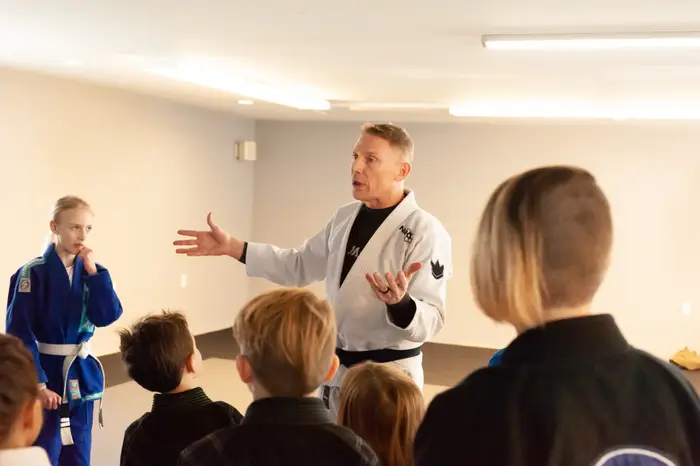 Partner drilling at a HeadNod jiu jitsu class
