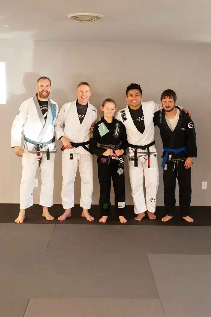 Student practicing a submission at HeadNod