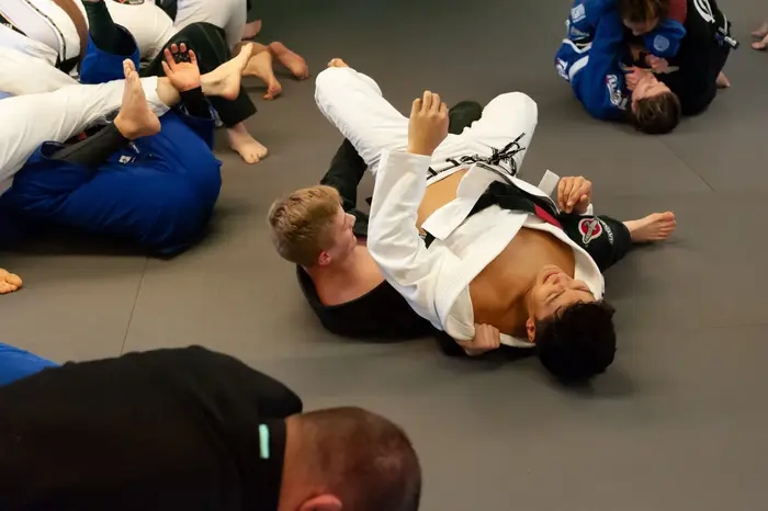 Group of HeadNod members on the mat