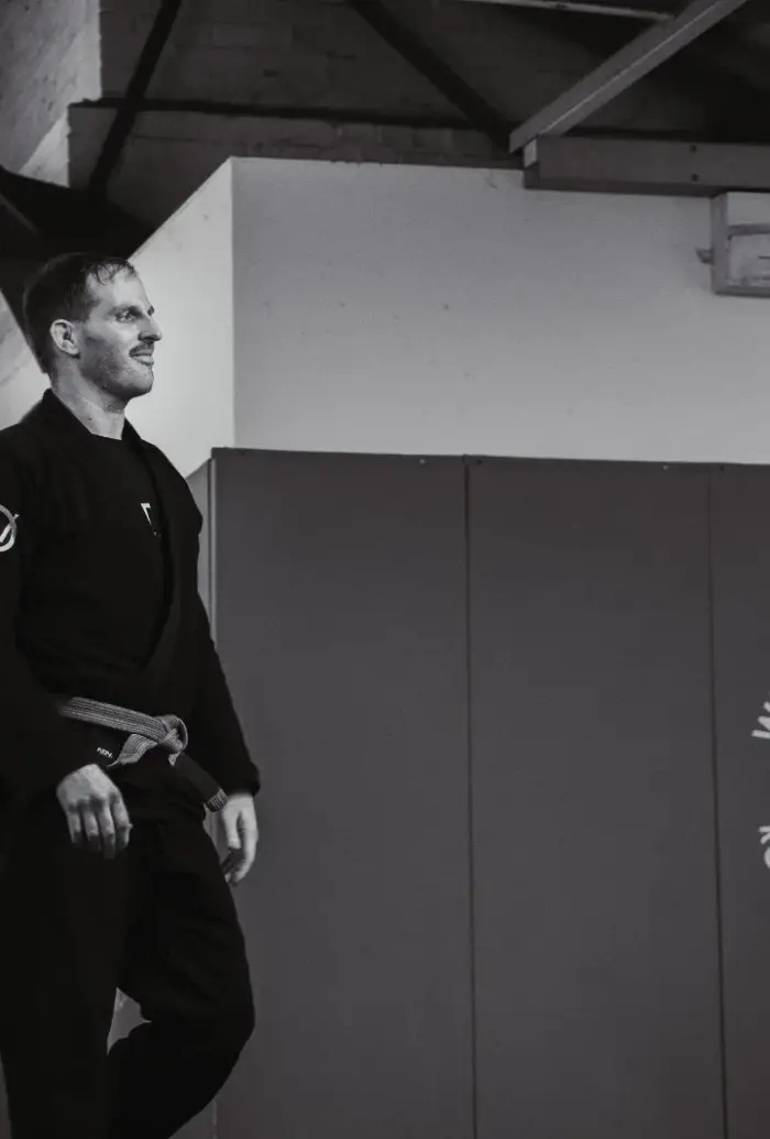Head coach Jack Brickley in his black gi and black belt