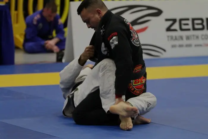 Grappling and live rolling during a Jay Pages BJJ class