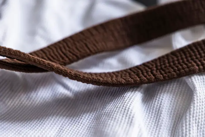 Folded Jiu Jitsu gi and belt