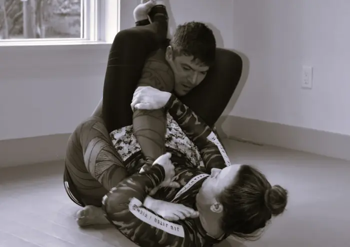 Coach Nick setting up a triangle while rolling