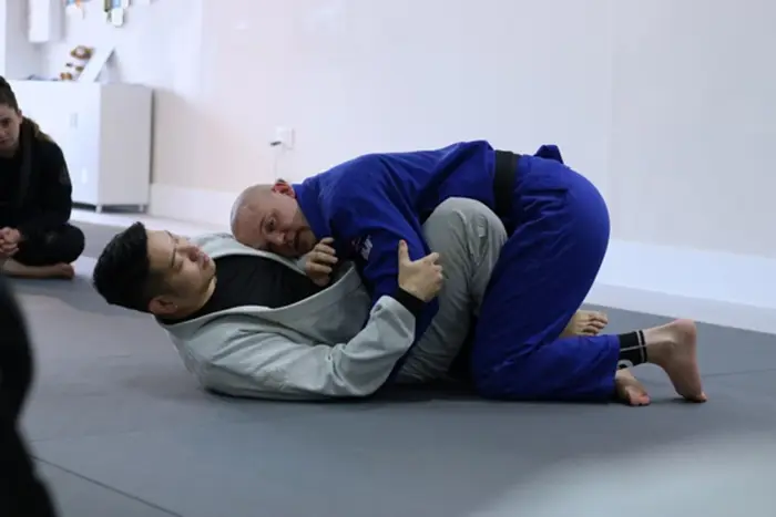 Students practicing live grappling rounds at the Alpharetta academy