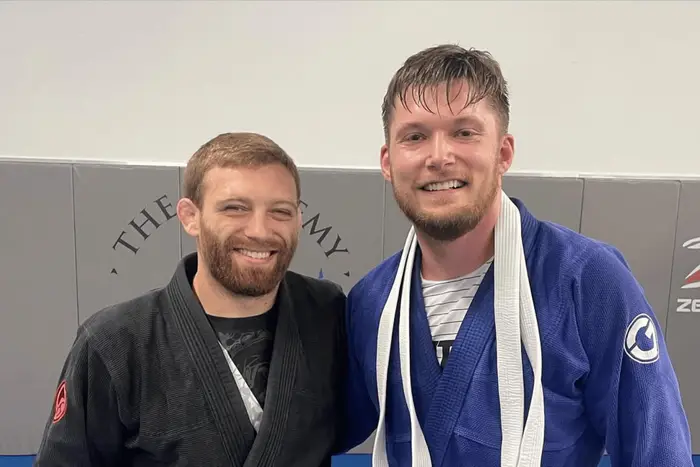 Two members in their gis after a Brazilian Jiu-Jitsu class