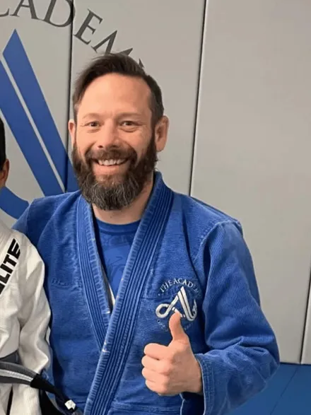 Hayden Buckner, BJJ Purple Belt · 3rd-Degree Black Belt (Karate) · Muay Thai Black Sash