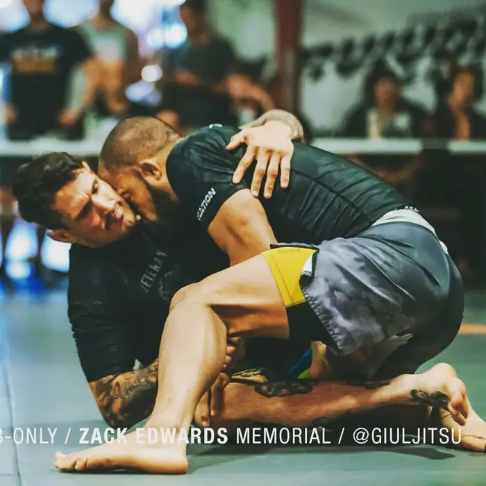 Two students sparring during a submission grappling class